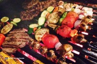 In der Cosina (argentinische Küche) sind die Parilleros (Köche) Meister in der Zubereitung von Fleisch auf der Parillada (Holzkohlengrill) in Amsterdam Holland Niederlande